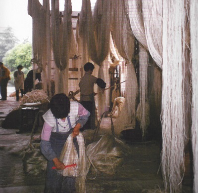 Grasscloth Being Hand Woven In Asia